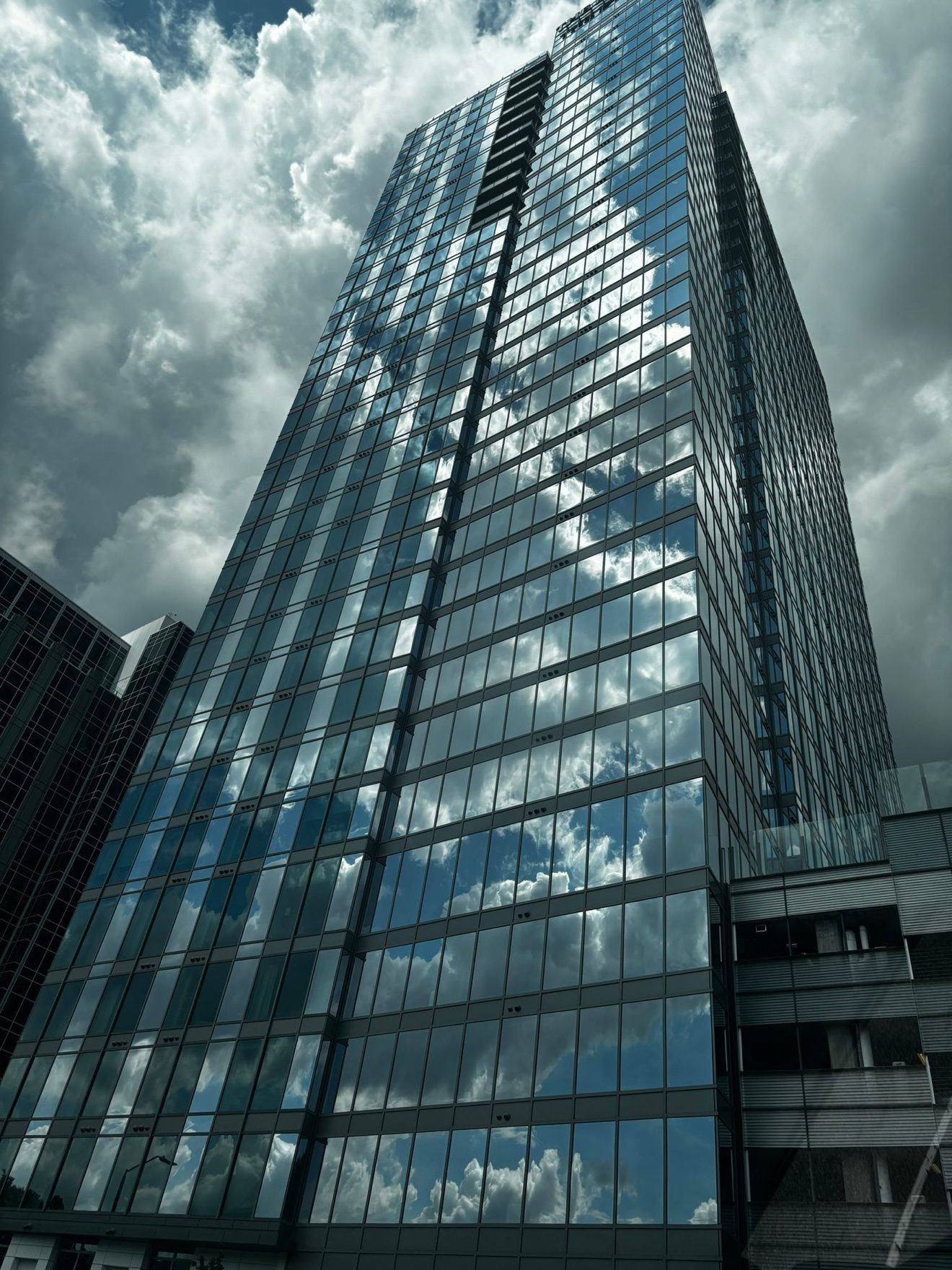 High-rise curtain wall tower glazed by Supreme Glaziers Inc crews